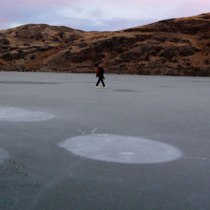 Methane seeps to the surface of this Arctic lake.