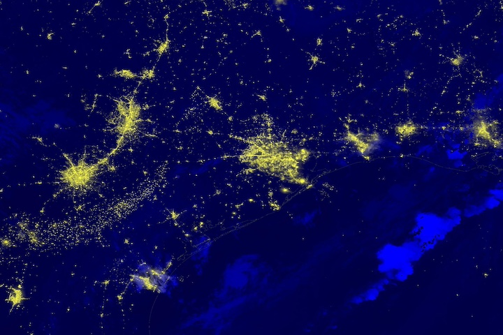 Black Marble Nighttime Blue/Yellow Composite (Day/Night Band) of Houston, Texas on July 9, 2024 showing reduced city lights due to power outages caused by Hurricane Beryl. Image from the VIIRS instrument aboard the joint NASA/NOAA NOAA-20 satellite