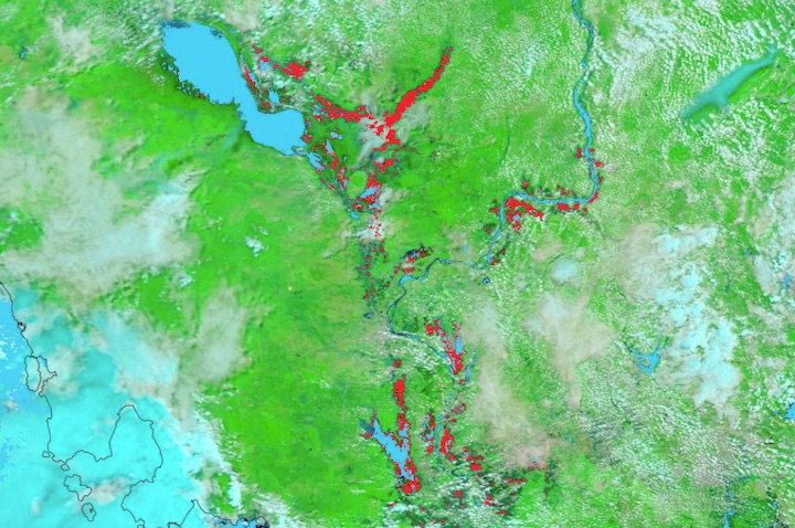 Worldview image of flooded areas with flooded ares in red and surrounding areas in green