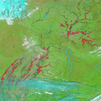 False-color corrected reflectance image overlaid with flood information of the Midwest and Southeast US on 10 April 2024 from the MODIS instrument aboard the Terra satellite