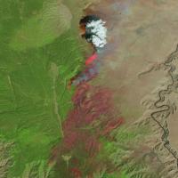 Satellite imagery showing burned area and active fire fronts from the Dragon Bravo fire.