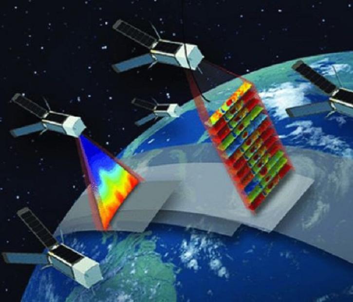 An artist's conception of the TROPICS SmallSat constellation in space over a tropical cyclone