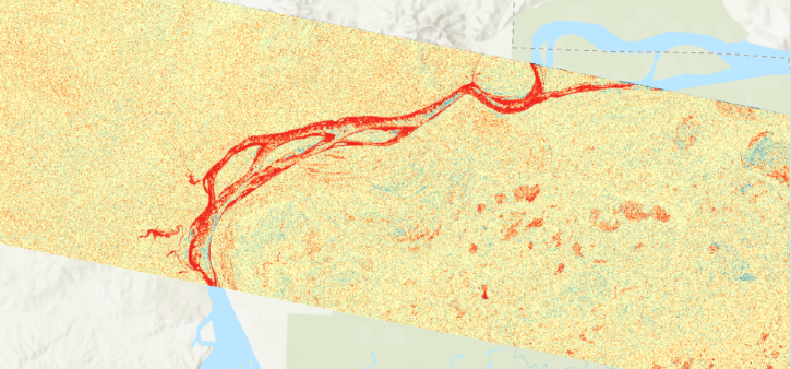 image showing a segment of rive with changes indicated in red, blue, and yellow colors.