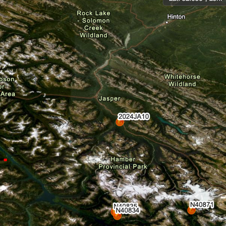 FIRMS US/Canada image on a true color basemap showing Jasper, Canada, and detected fires