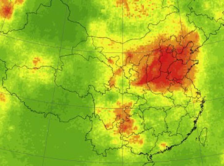 Spatial distribution of the OMI-derived ground-level sulfur dioxide concentration in 2005 across China, with higher levels shown in red and lower levels shown in yellow and green.