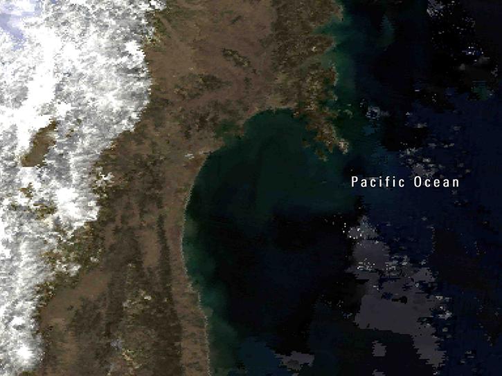 A Terra/Aqua MODIS composite true-color surface reflectance image of the study area approximately three days after a tsunami