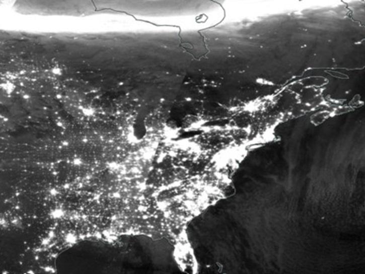 This Day/Night Band image from the VIIRS instrument aboard the Suomi NPP satellite features an aurora in the northern hemisphere on February 22, 2017.