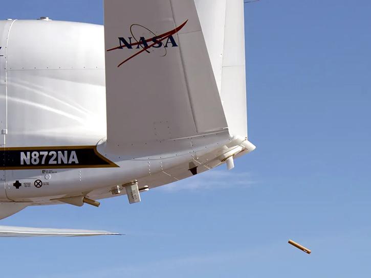 dropsonde being deployed from aircraft