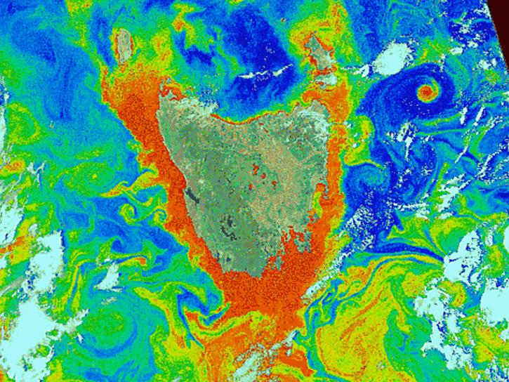 Ocean color around Tasmania (false color). Red and orange colors indicate high levels of phytoplankton.