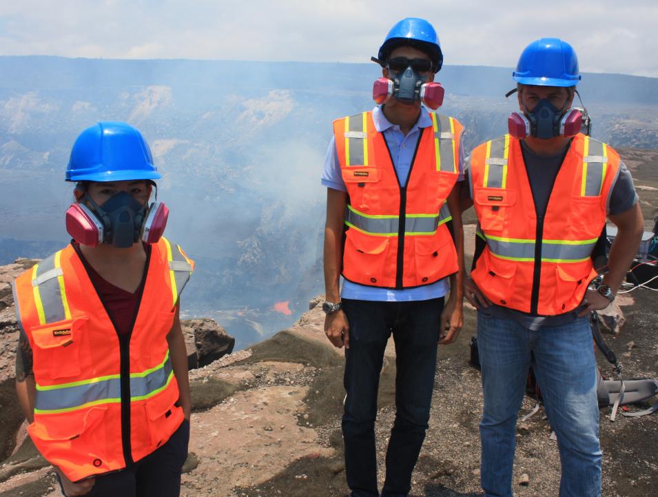 Photograph of Dr. Wright (right) in the field at the Halemaumau lava lake in 2018