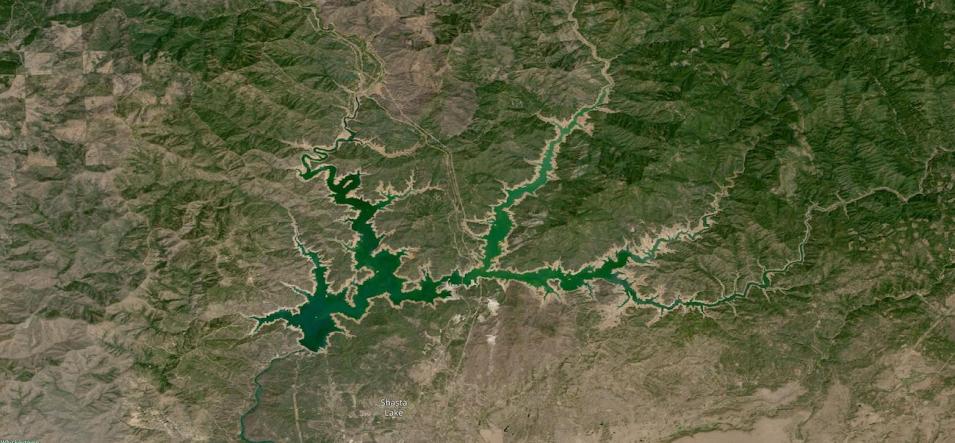 True color Landsat 9 image of Shasta Lake at low capacity, exposing the brown shoreline of the reservoir, on 14 August 2022
