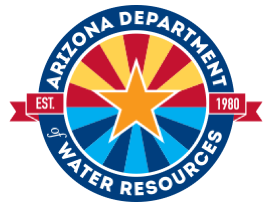 Circular image with Arizona Department on top and of Water Resources on bottom; EST. 1980 on sides; yellow star in center with red/orange rays on top and blue/dark blue rays on bottom.