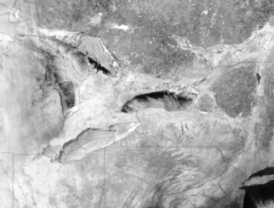 Image from MODIS of Lake Huron, Lake Erie, and Lake Ontario on January 27, 2003, showing water, snow, and clouds.