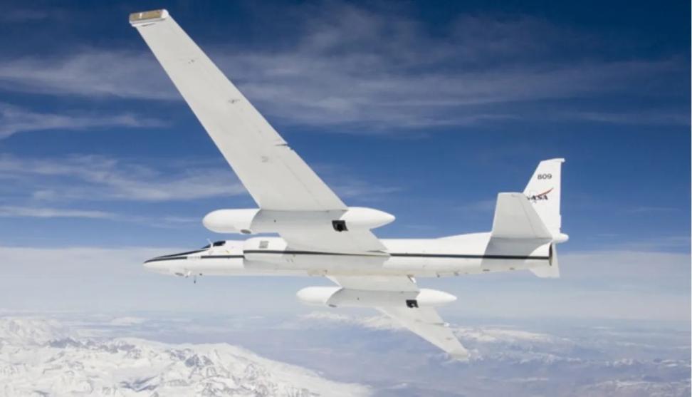The Earth Resources (ER-2) aircraft flies above the clouds