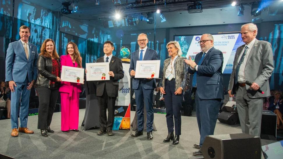 IMPACT members receive a Special Award on Space for Climate Protection from the International Astronautical Federation
