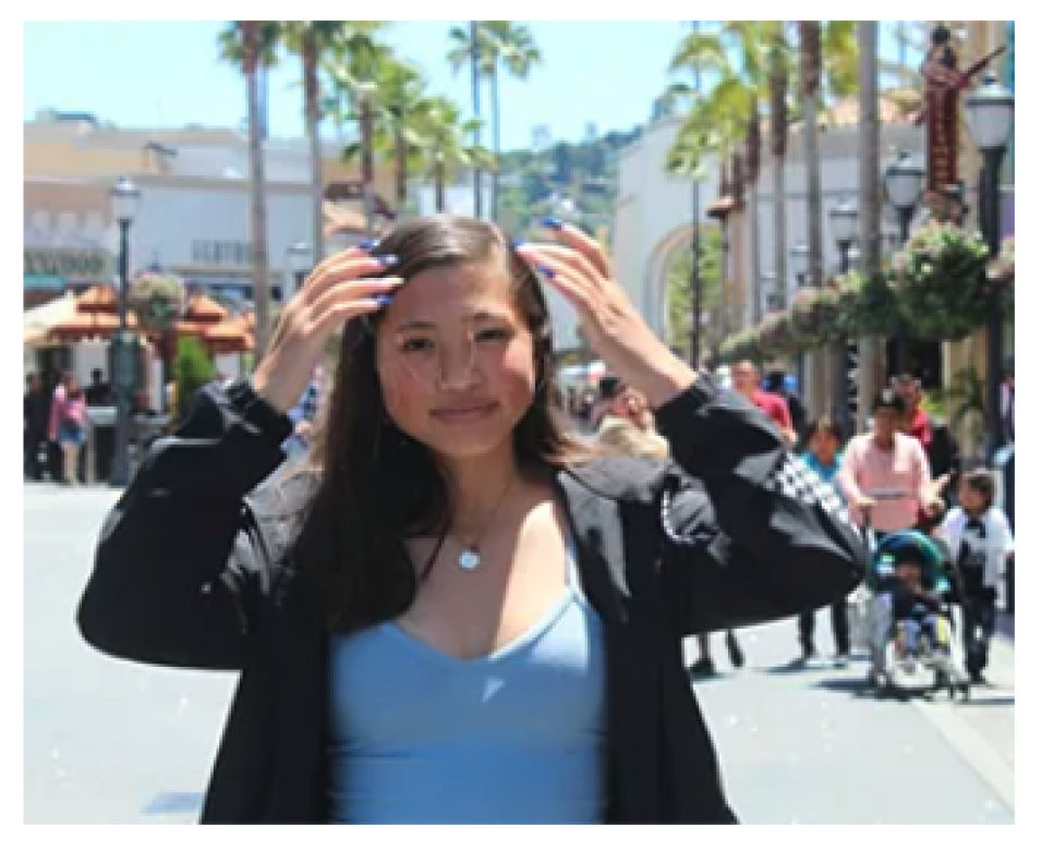 Emma Chu, Careers in Science a young level 2 intern standing outside.