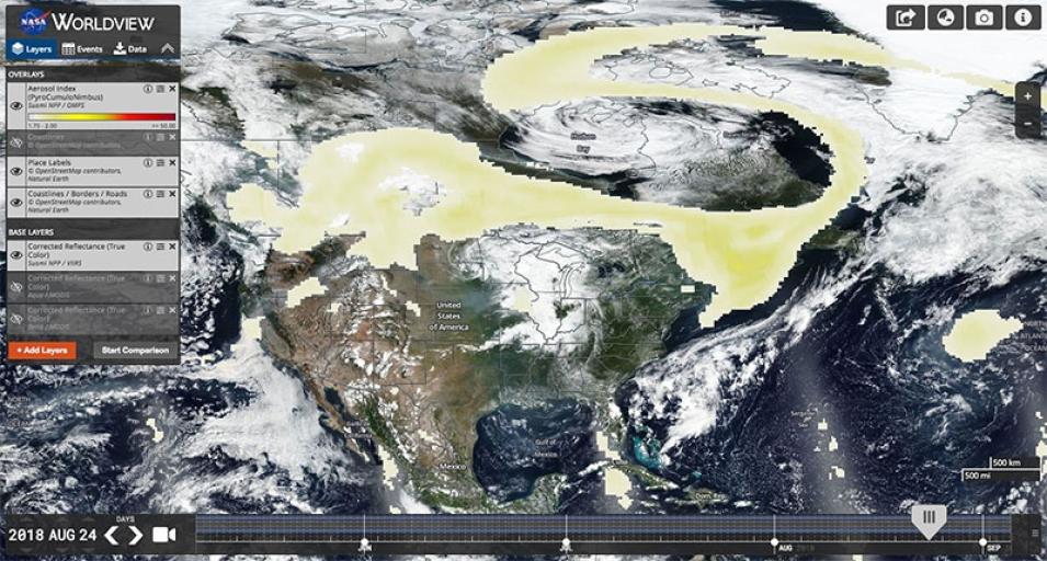 Screenshot of Worldview imagery of North America, with swirling yellow areas representing aerosol concentrations.