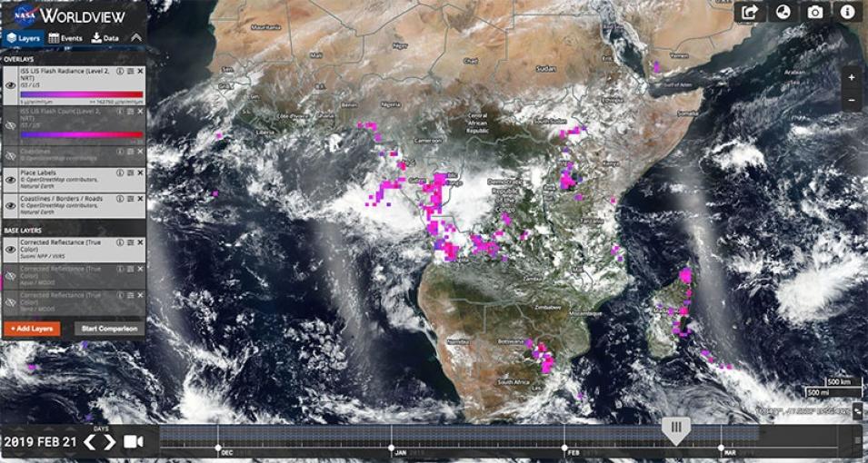 Screenshot of Worldview showing a satellite image of Africa, with bright pink areas indicating lightning flash concentrations.