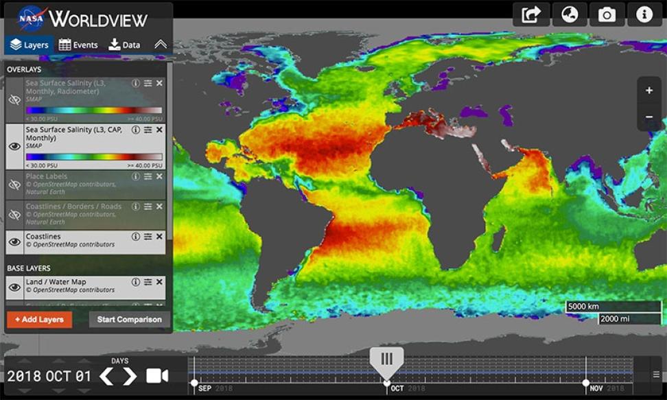 Screenshot of Worldview showing a world map with land masses in gray surrounded by a colorful global ocean, with reds and yellows indicating higher sea surface salinity and blues and purples indicating lower salinity.