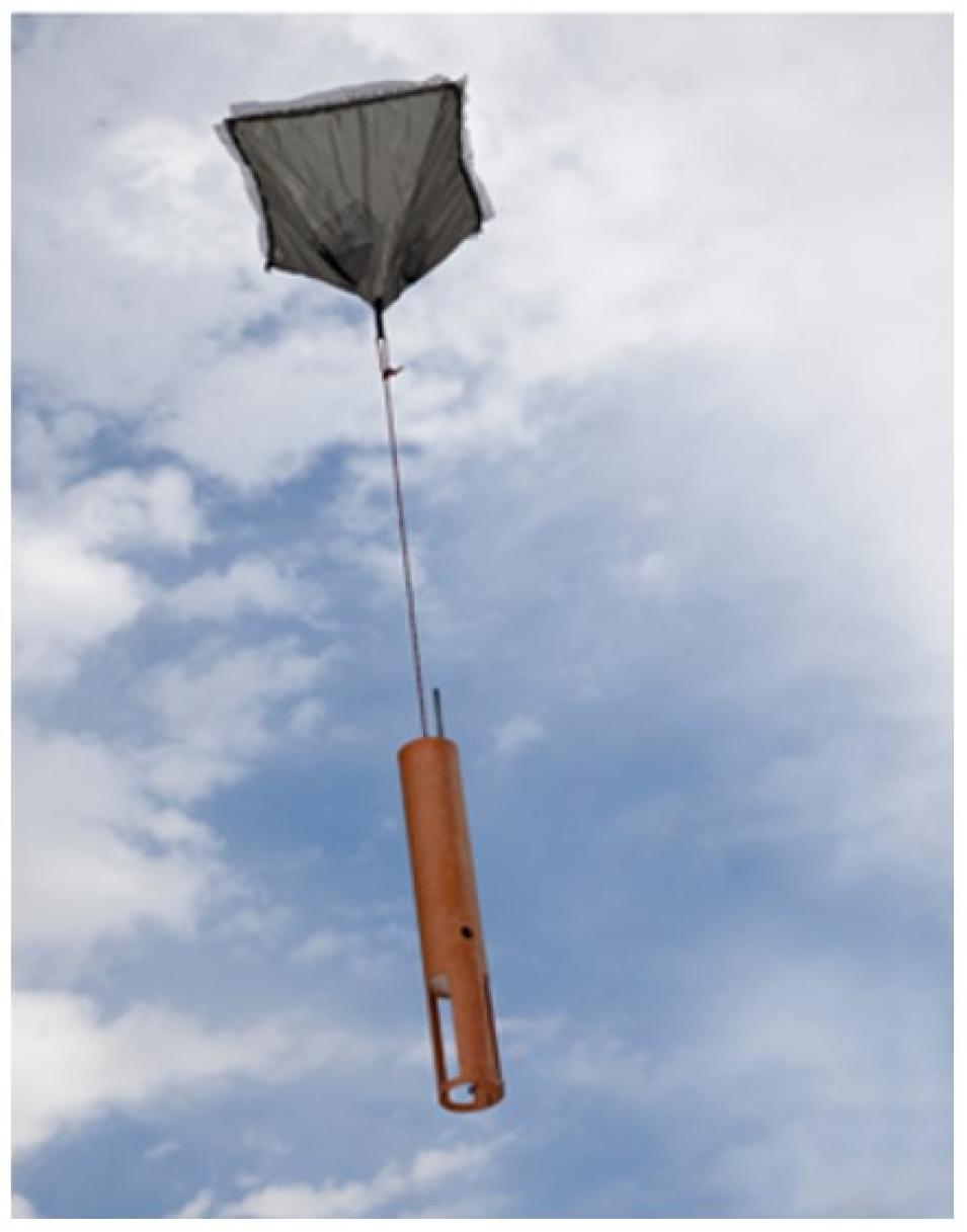 A dropsonde from the Airborne Vertical Atmospheric Profiling System (AVAPS) falls to Earth while collecting data on the atmosphere.