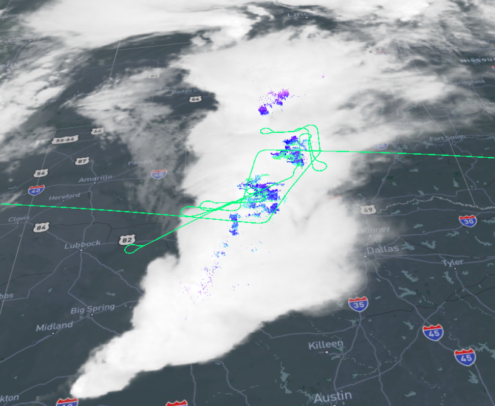 image showing clouds over a street map with colors indicating rain and green lines indicating flight paths