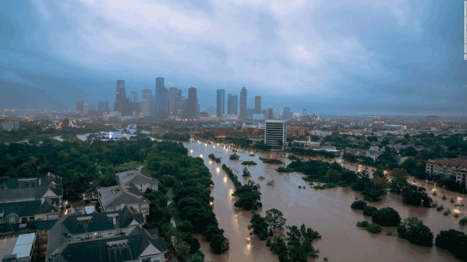 Image of houston texas showing fooded roads with city in background.