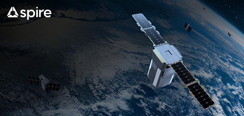 Artistic representation of Spire satellites in orbit around Earth; includes Spire name and logo