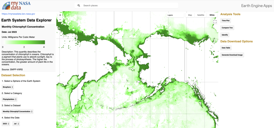 Screenshot of the Earth Science Data Explorer tool showing a map of Alaska and Russia, with coastal areas colored in various shades of green. Darker green indicates higher chlorophyll concentrations.