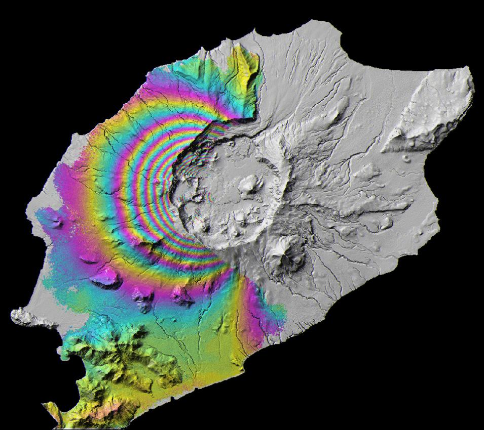 Surface deformation on Okmok, a volcano in the Aleutian Islands, is revealed in this interferometric SAR (InSAR) ERS-2 image. Each color cycle represents 2.8 cm of ground surface movement 