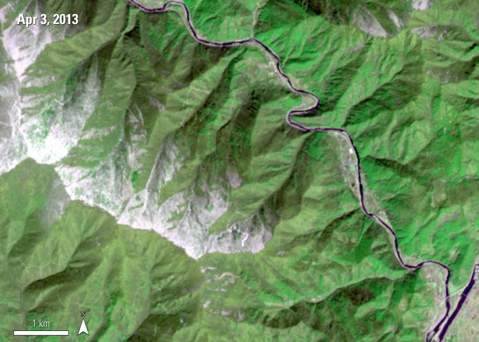 The Mount Gariwang sacred forest area prior to the deforestation effort for the 2018 Winter Olympics is shown using the pseudo-true color band combination 2-3-1. Grass is shown as green, infrastructure as magenta, snow as white, and water as blue.