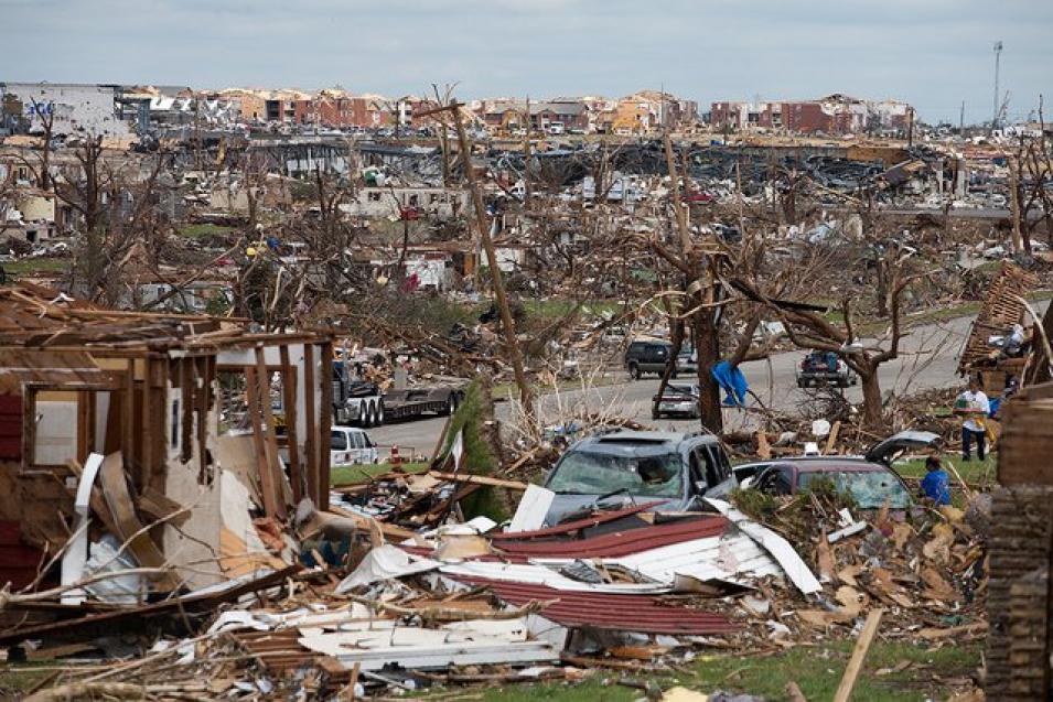 The aftermath of the Joplin, MO tornado showing destroyed buildings and debris.