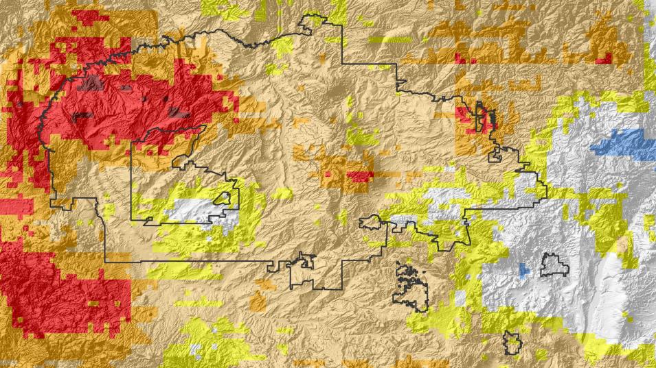 This is a color topographical map of the Navajo Nation. Various areas are outlined in black or colored red, yellow, white, blue, tan, or orange. No key is present to explain what the different colors mean.