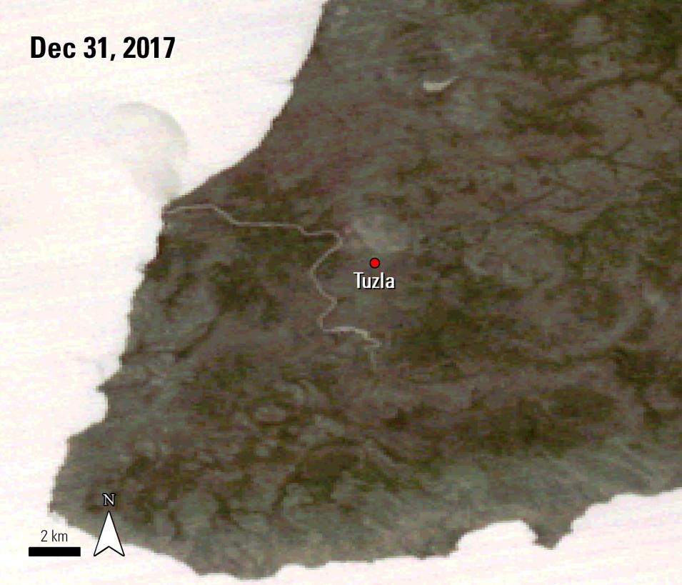 A thermal ASTER image showing part of Turkey near the Tuzla Village, located in western Turkey. The image is shades of gray and shades of white, including areas where geothermal sources may exist.