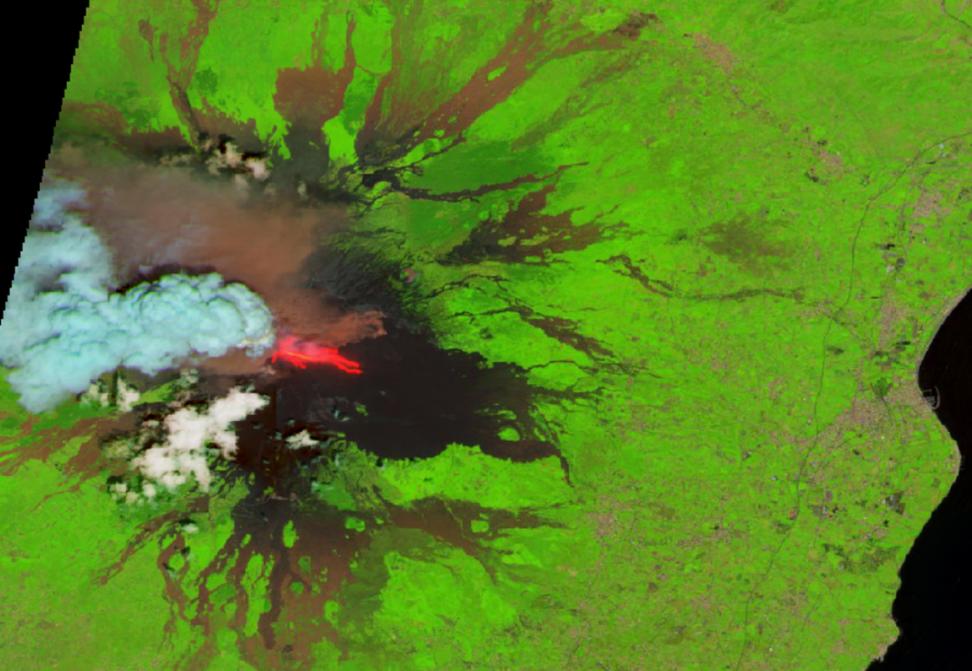 This HLS 30-meter reflectance vegetative false color (Bands 11, 8A, and 4) image from NASA Worldview showing the eruption of Mt. Etna on June 2, 2025. 