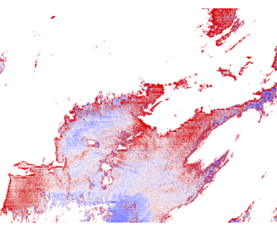 This image shows large and small blotches of color made up of blue to red pixels clustered together on a white background.