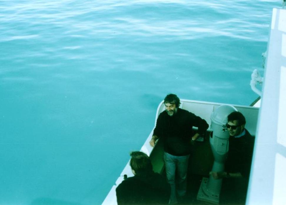 Bright blue-green waters of a coccolithophorid bloom are seen here from the deck of a research vessel. 