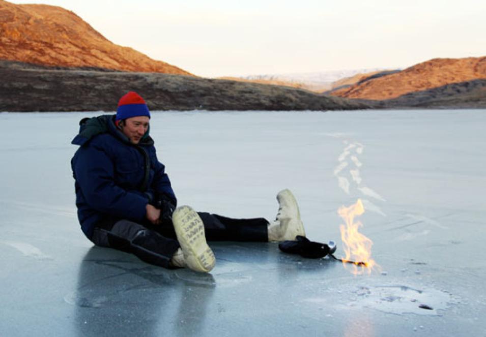 Photograph of a researcher locating a plume of methane