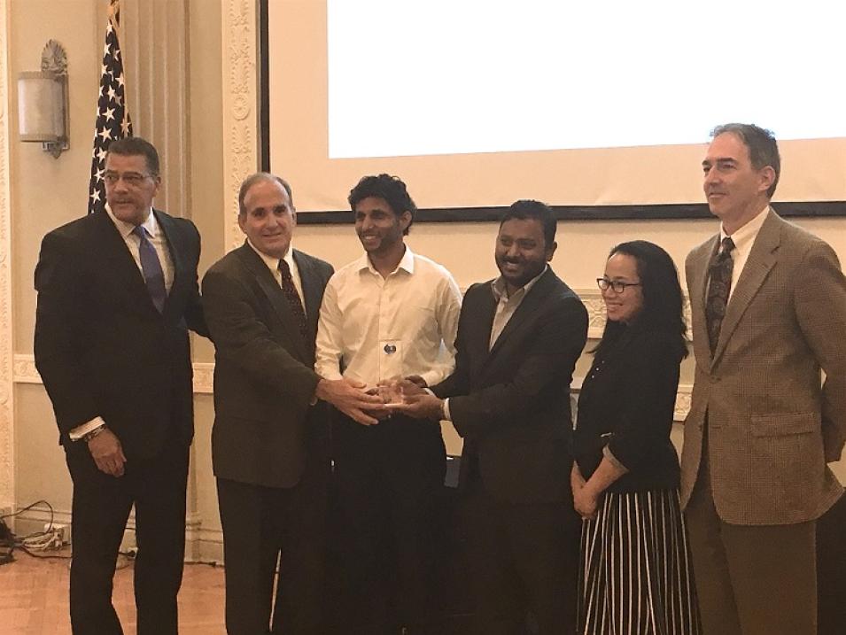 ORNL DAAC representatives accept the FGDC Doug D. Nebert NSDI Champion of the Year Award
