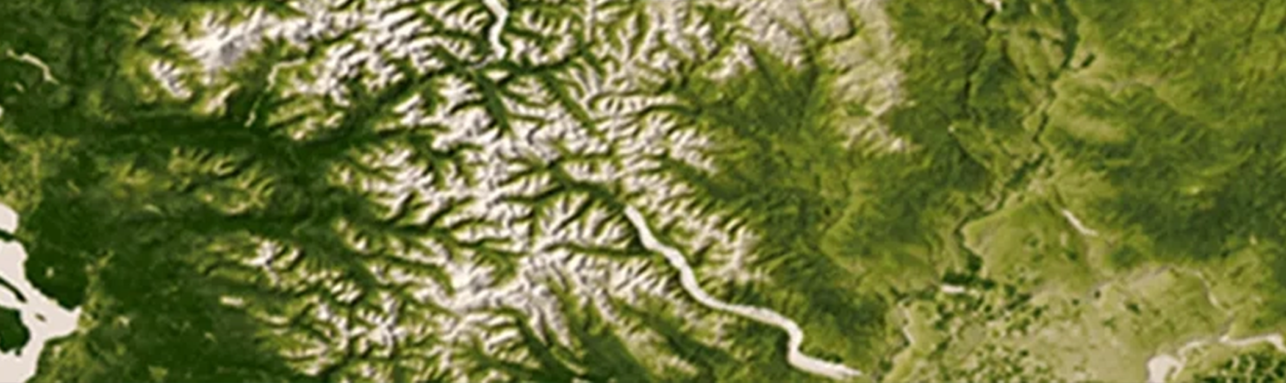 This NDVI satellite image shows a portion of the Pacific Northwest, specifically the Rocky, Cascade, and Coast Mountain Ranges. 