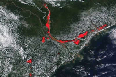 Flooding in Mozambique and Malawi shown in red overlaid on a true color corrected reflectance image from the MODIS instrument aboard the Terra satellite on 23 March 2023