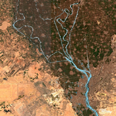 High resolution image of Cairo, Egypt, with city in brown; blue ribbon indicates path of Nile River through the city