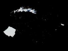 True-color corrected reflectance image of Icebergs A23a and A23c near the South Georgia Island, Antarctica on 3 May 2025 from the VIIRS instrument aboard the joint NASA/NOAA NOAA-21 satellite.