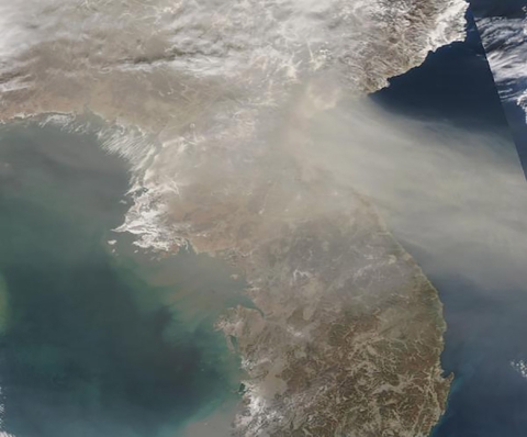 A thick blanket of haze, likely dust from China’s Gobi Desert, hung over the Korean Peninsula when the Moderate Resolution Imaging Spectroradiometer (MODIS) on board NASA’s Aqua satellite acquired this true-color image on January 14, 2021. A broad light tan plume stretches over North Korea, with the air over South Korea remaining clear. In eastern North Korea the haze is so thick that it obscures the land from view.